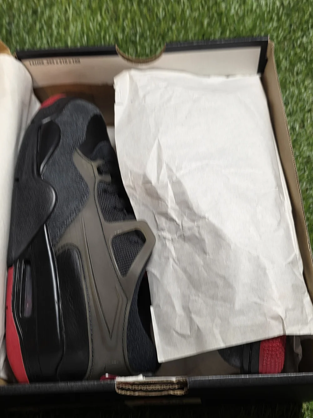 Nike Men's Black Sneakers with Red Accents